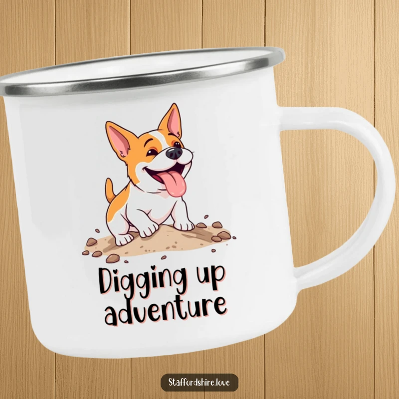 Funny, energetic Staffordshire dog with a happy pant, digging enthusiastically in soft earth on a durable enamel camping mug.