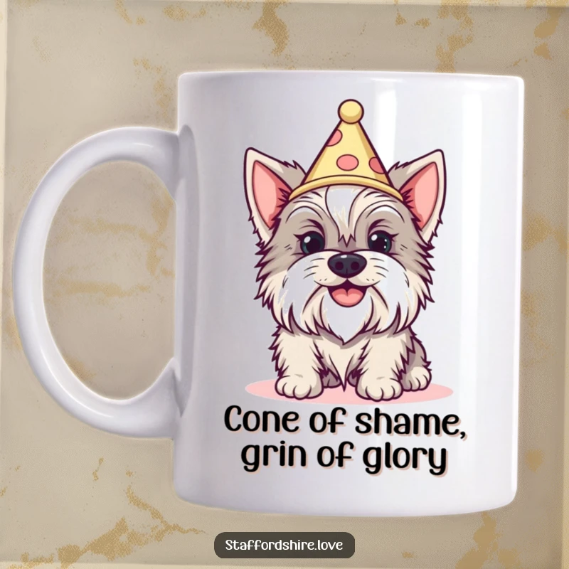 Funny Staffordshire dog with a silly grin wearing a tiny cone party hat on a mug. Great gift.