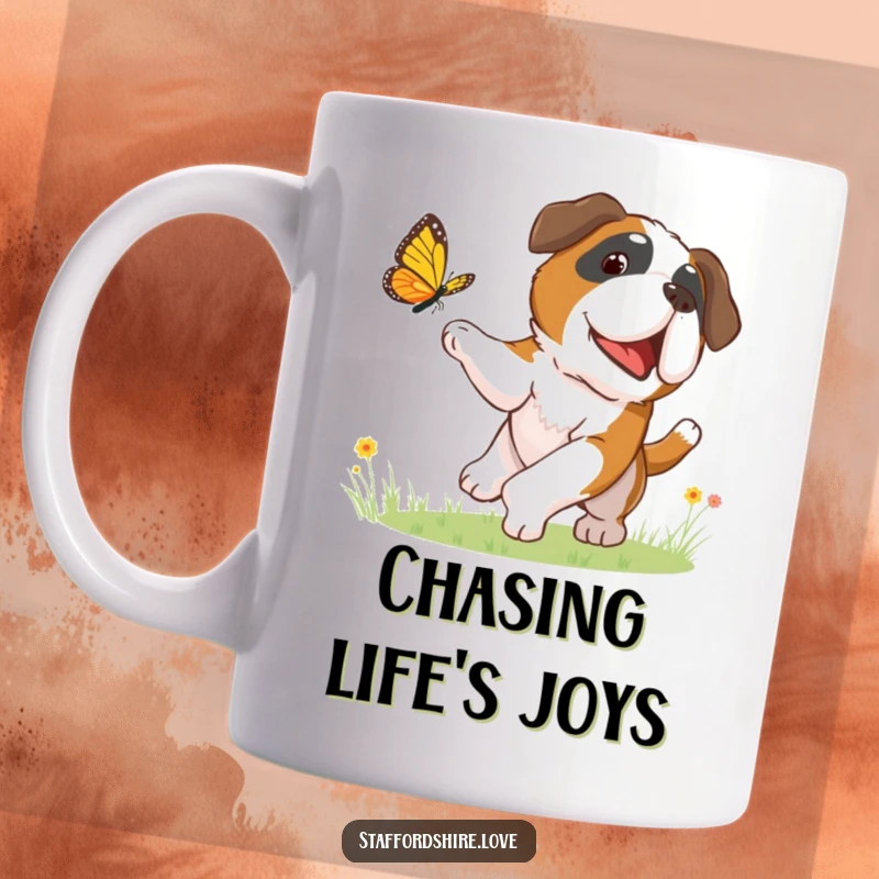 Funny mug showing a happy Saint Bernard dog playfully chasing a colorful butterfly through a sunny meadow with glee.