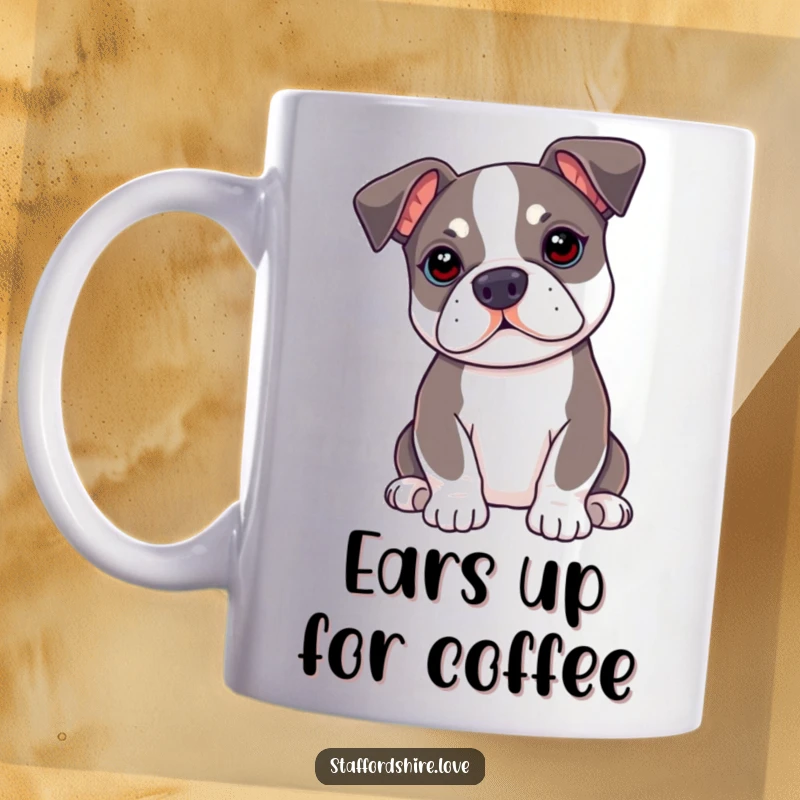 Funny kawaii Staffordshire Bull Terrier mug with floppy ears perked up, embodying attentive listening and adorable readiness.