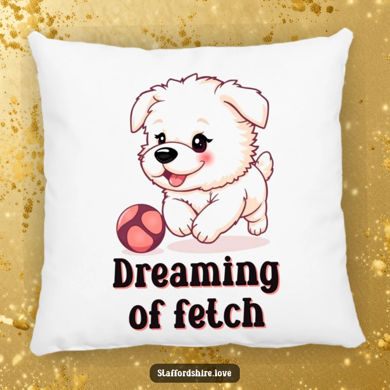 Funny, fluffy Staffordshire puppy with rosy cheeks, playfully chasing a bouncing ball on a soft, decorative pillow.