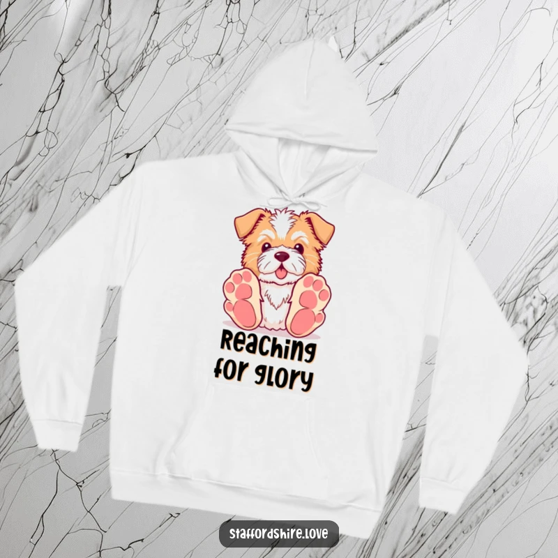 Funny Kawaii Staffordshire hoodie featuring a dog with oversized paws reaching for a toy, perfect for cozying up with playful charm.