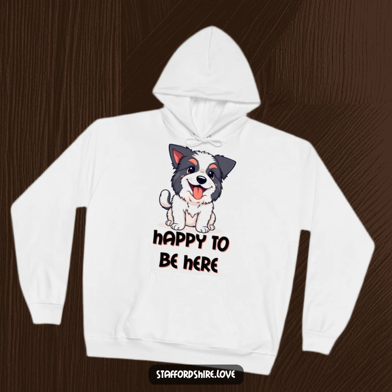 Funny kawaii Staffordshire hoodie, depicting a happily panting dog with a wagging tail, designed for warm, humorous enjoyment.