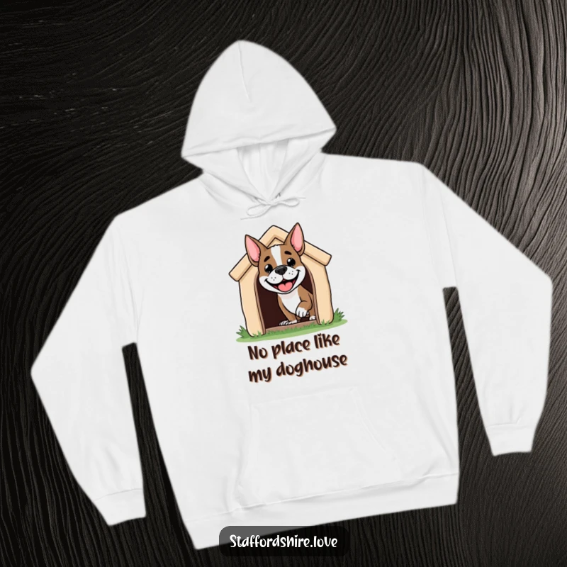 Funny Staffordshire dog hoodie showing a happy dog peeking out of its doghouse, a warm embrace for lovers of canine comedy.