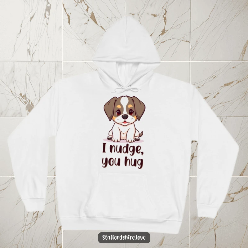 Funny kawaii Staffordshire puppy with floppy ears, playfully nudging on a hoodie, offering cozy and humorous companionship.