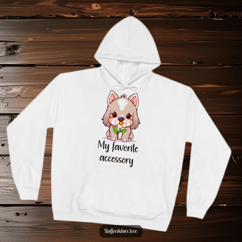 Funny Kawaii Staffordshire Hoodie, featuring a cute Staffy gently holding a flower in its mouth, offering cozy comfort and a touch of sweet humor.