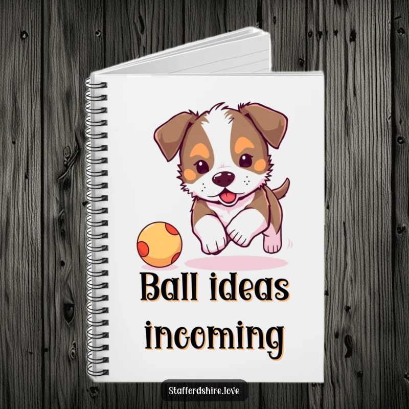 Funny, cute Staffordshire puppy chasing a bouncy ball on a notebook cover. Perfect funny gift for writers.