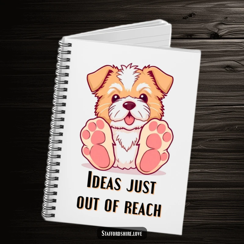 Funny Kawaii Staffordshire notebook featuring a dog with big paws reaching for a toy, perfect for jotting down notes playfully.