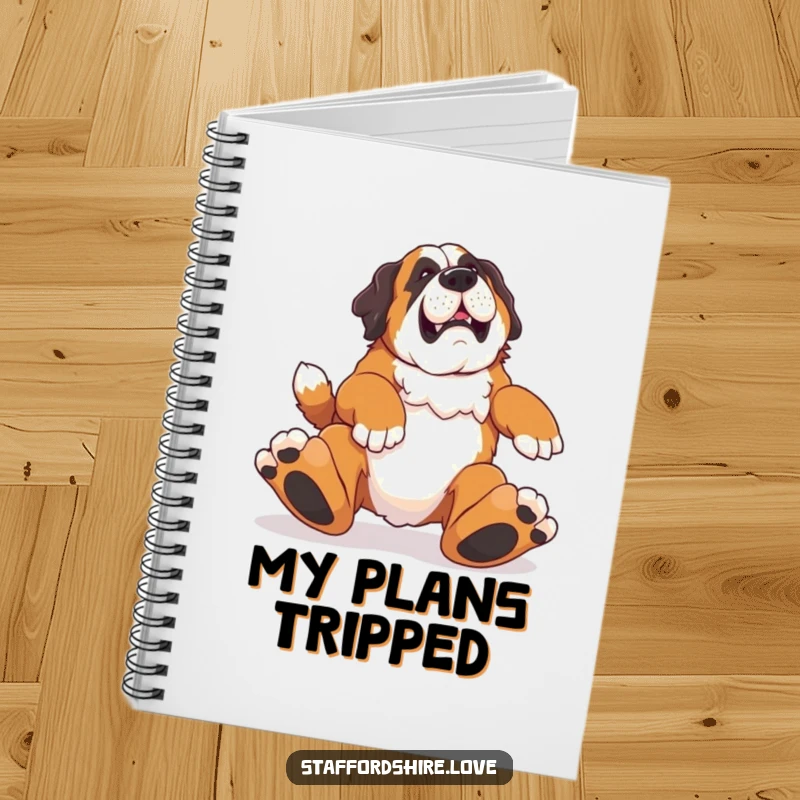 Funny notebook featuring a Saint Bernard tripping comically, perfect for capturing ideas with a touch of humor.