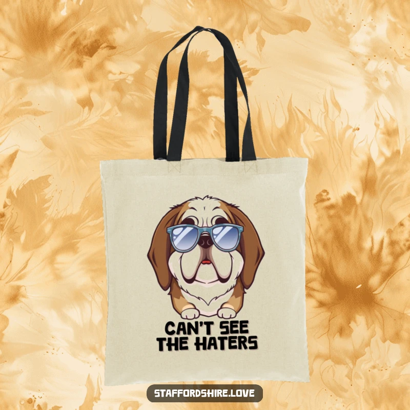 Funny Saint Bernard tote bag illustrating a large dog with a silly expression attempting to wear small sunglasses, a great accessory.