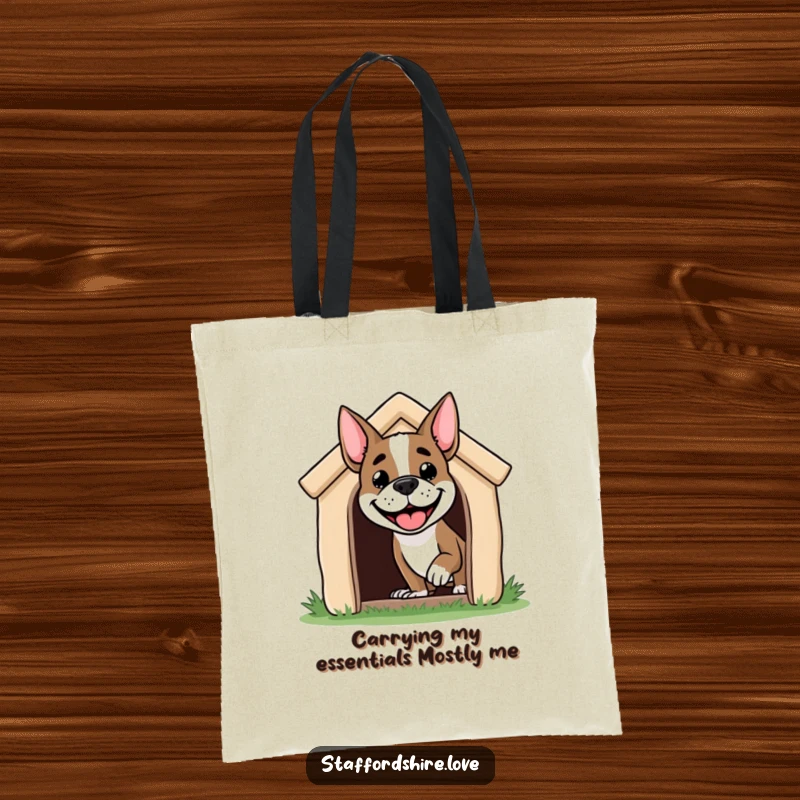 Funny Staffordshire dog tote bag featuring a grinning dog's head emerging from a doghouse, a cheerful and practical accessory.